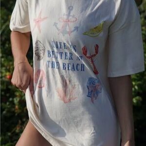 Life is better at the beach. Oversized tee. Size M/L but runs big. Worn once.